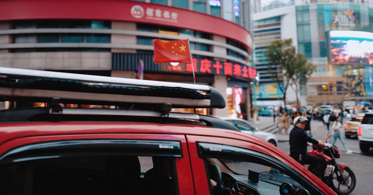 didi china - city traffic with vehicles on road