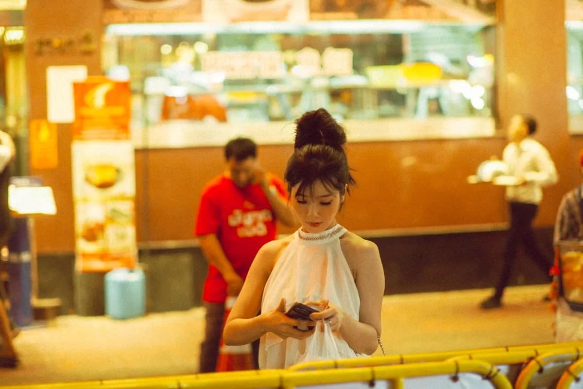 Woman using smartphone for mobile payment