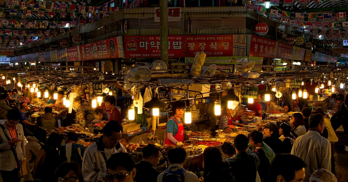 xian food - evening street scene with people eating at outdoor stalls