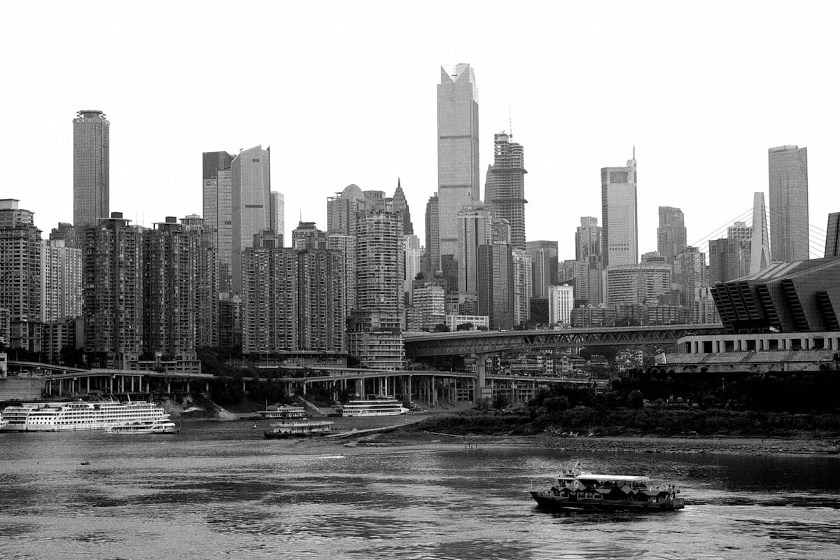 Modern Chongqing skyline reflected on the Yangtze River with bridges and skyscrapers