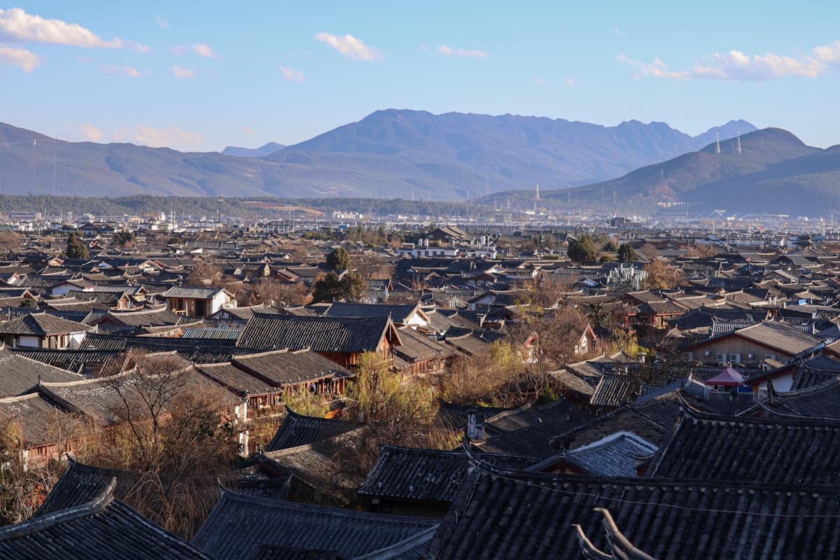 Traditional wooden buildings and cobblestone streets in Lijiang Old Town UNESCO World Heritage site Yunnan China