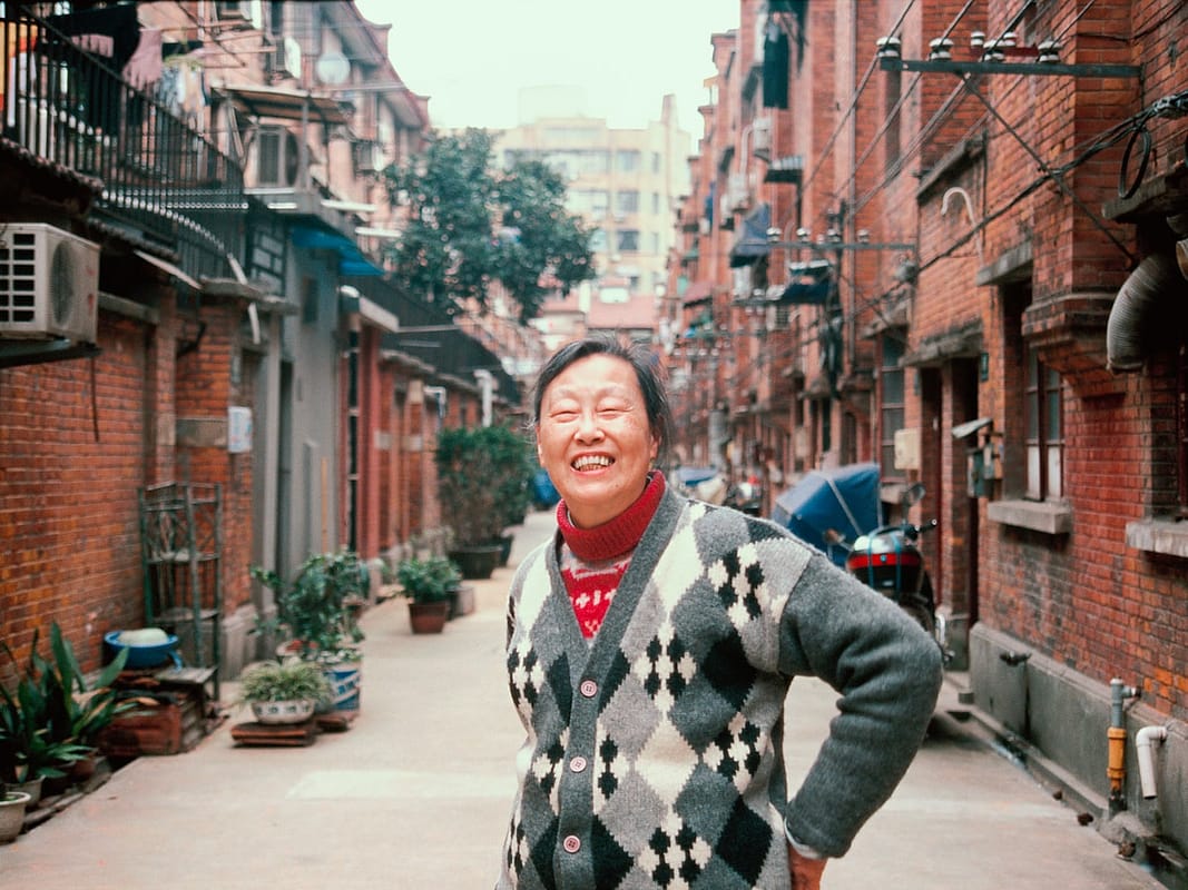 Historic Shanghai street scene with traditional architecture and daily life