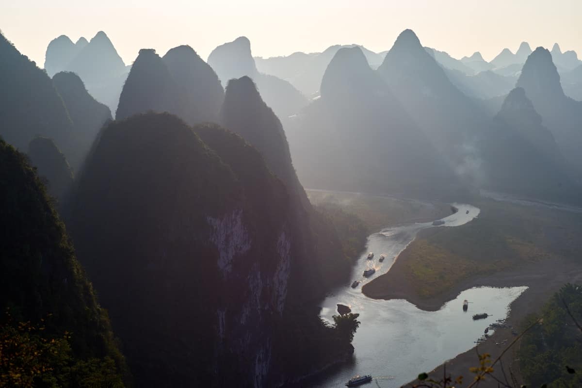 Dramatic limestone karst peaks along the Li River in Yangshuo Guilin China