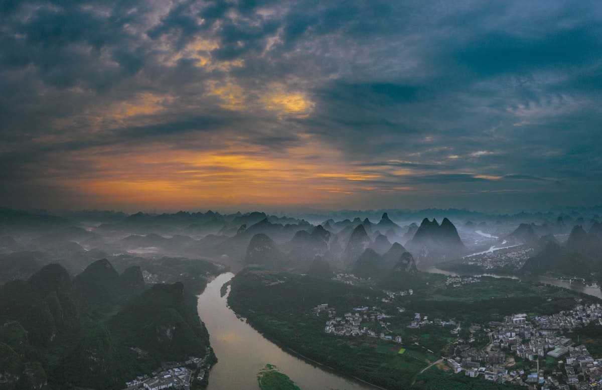 Panoramic view of karst mountains and rice paddies in Yangshuo countryside China