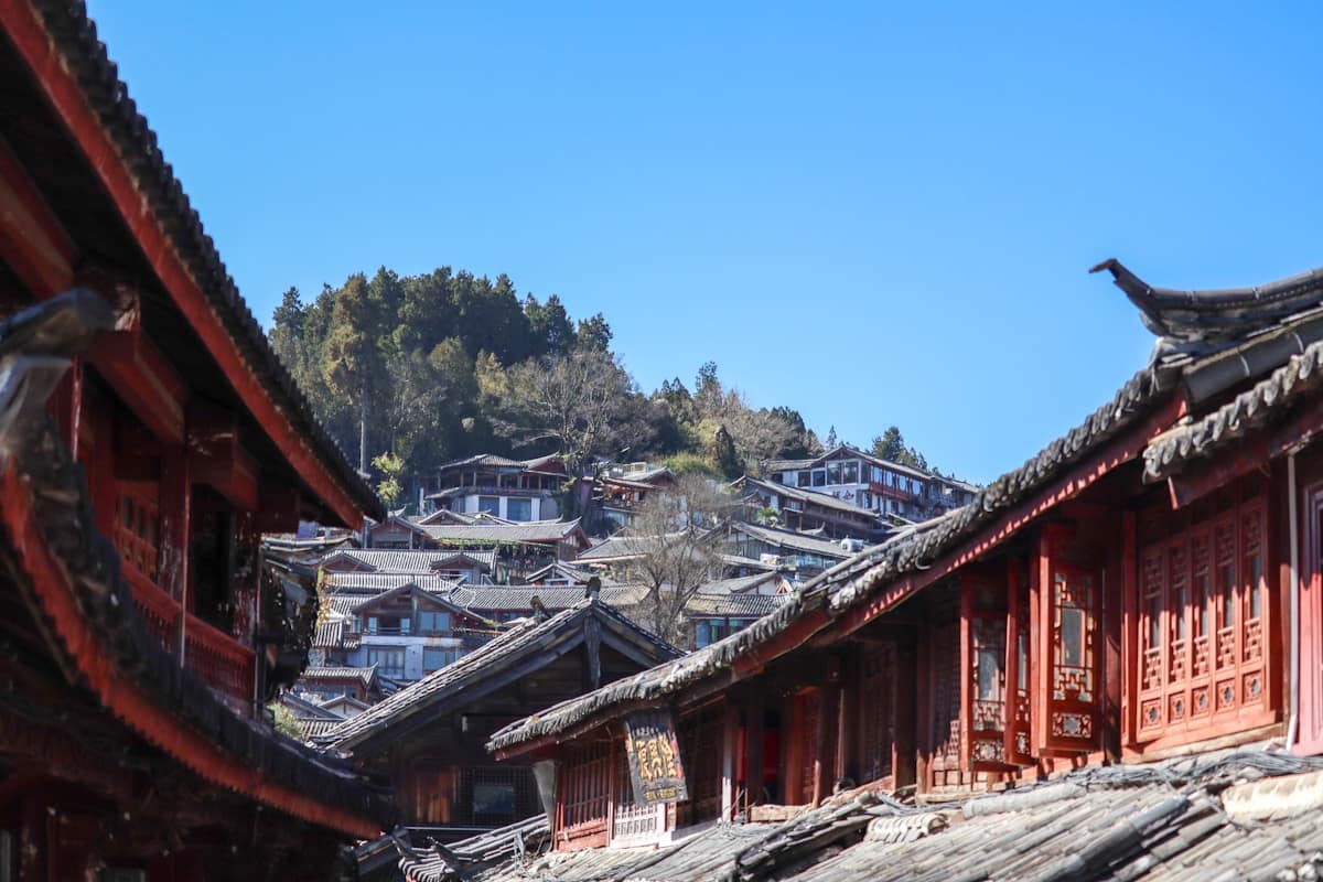 Ancient Naxi-style buildings with red lanterns in Lijiang Old Town Yunnan
