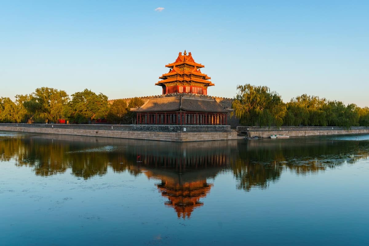 beijing temple summer haze - wooden temple roof against pale sky