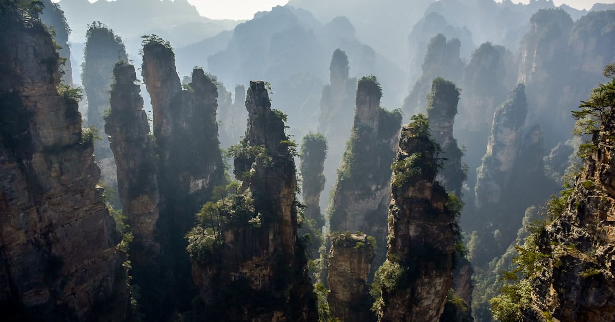 zhangjiajie mountains - foggy sandstone pillar formations in mist