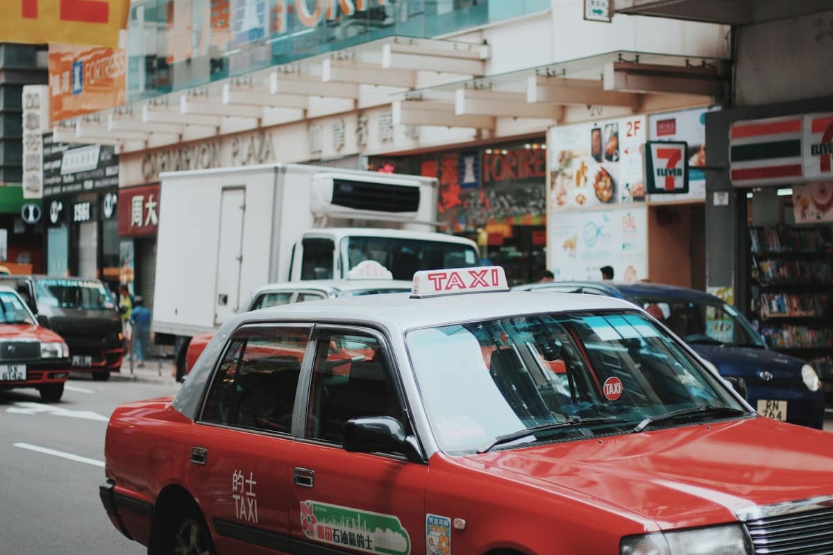 didi maps china - chinese taxi driver behind wheel at night