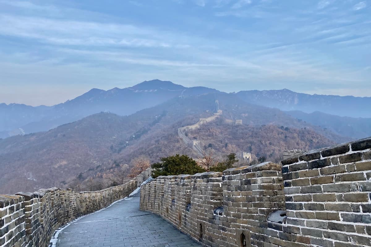 great wall china experience - empty watchtower corridor in winter light
