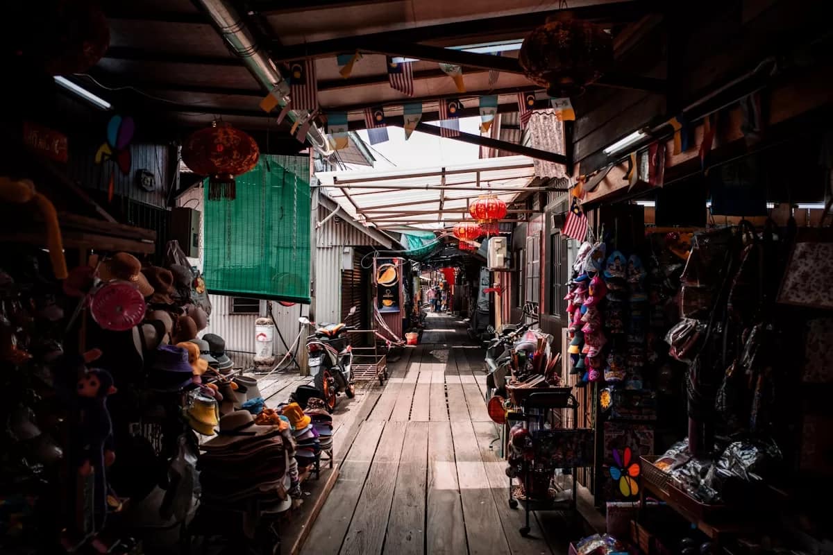 Independent traveler exploring Chinese street market with smartphone