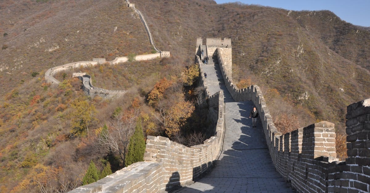 great wall china - Great Wall stretching across rolling hills in autumn