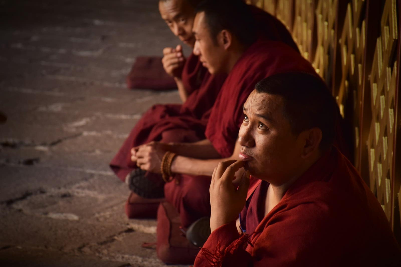 tibet travel permit 2026 - Buddhist monks inside Jokhang Temple in Lhasa