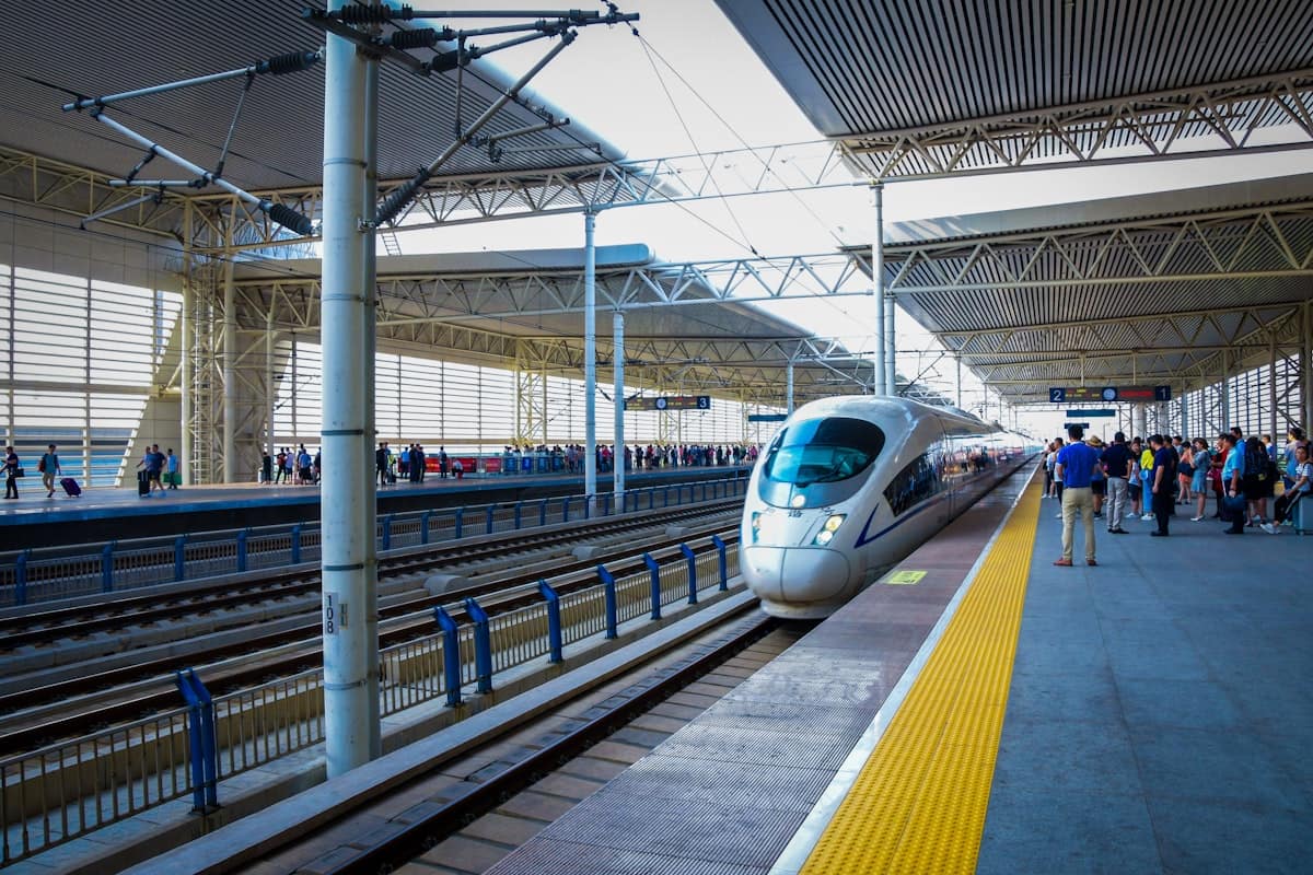 china family summer trip - high-speed train platform