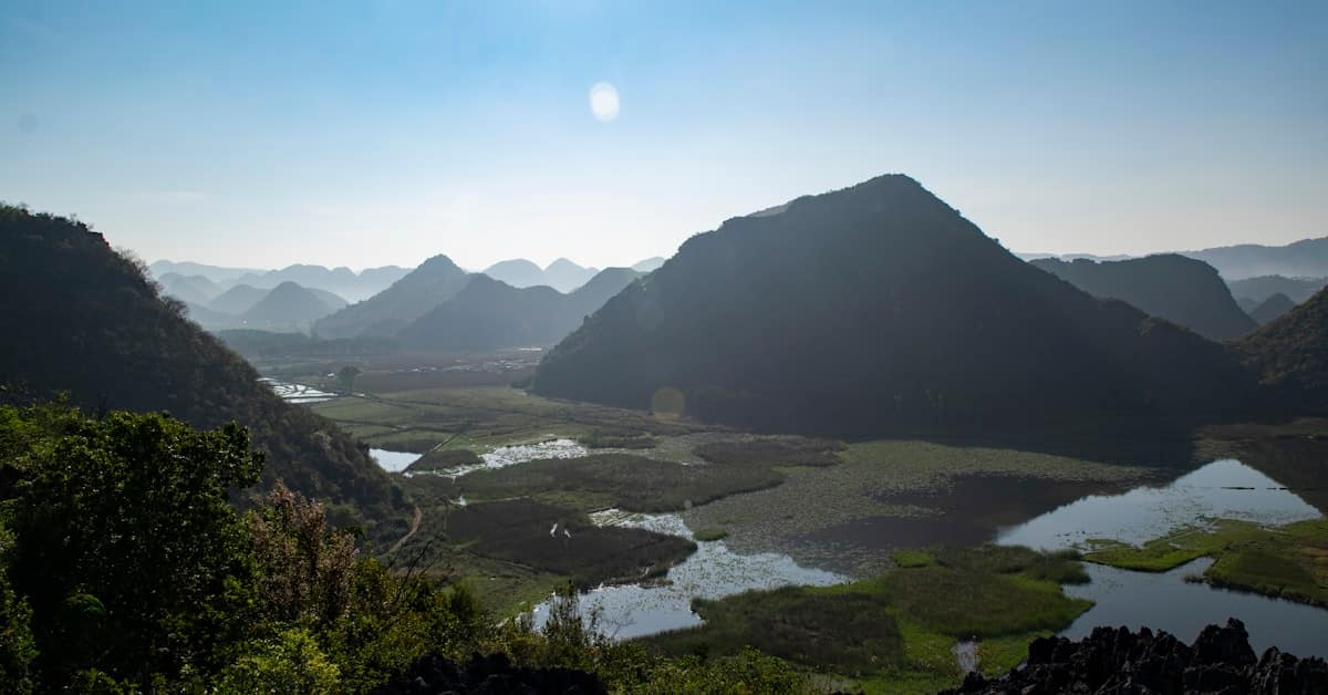 china in july - green mountains and valleys in Yunnan province during summer
