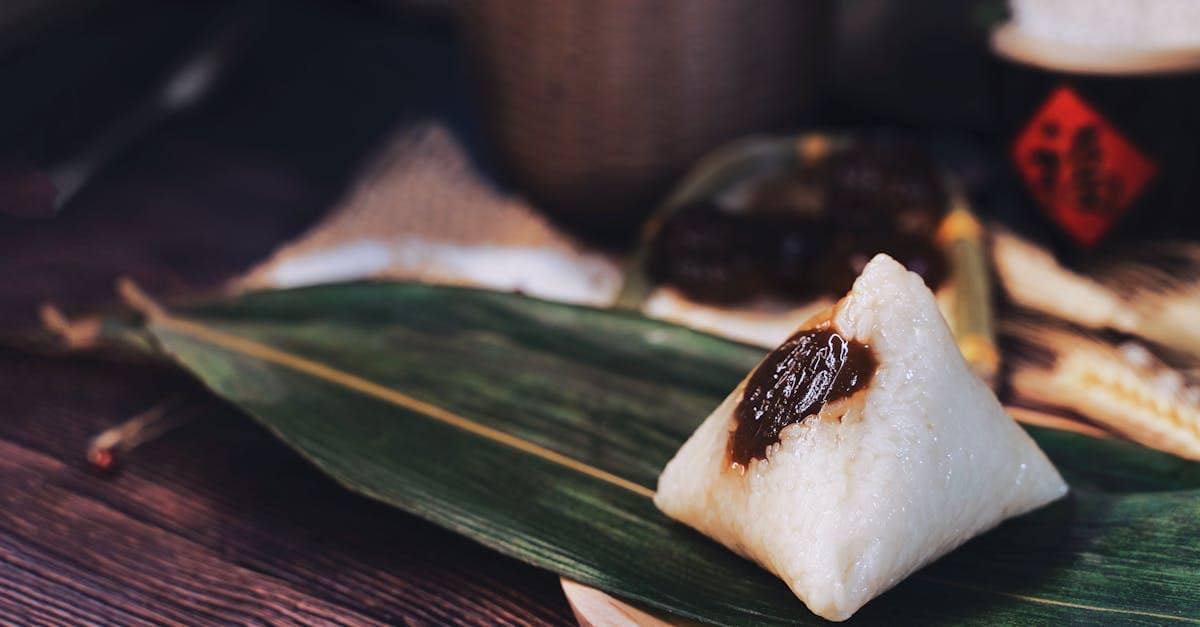 zongzi rice dumpling - traditional sticky rice wrapped in bamboo leaves for Dragon Boat Festival