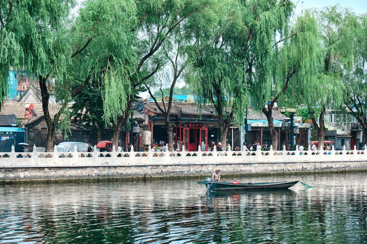 beijing shichahai houhai lake - boats on water near trees